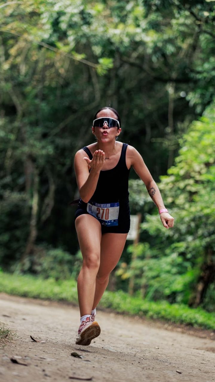 A runner on a forest trail during a race
